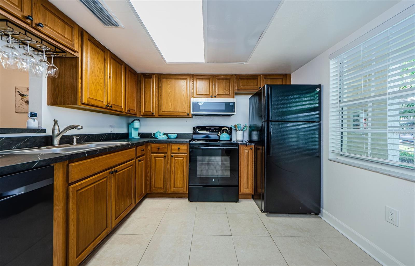 Light and Bright kitchen with built in glass holder