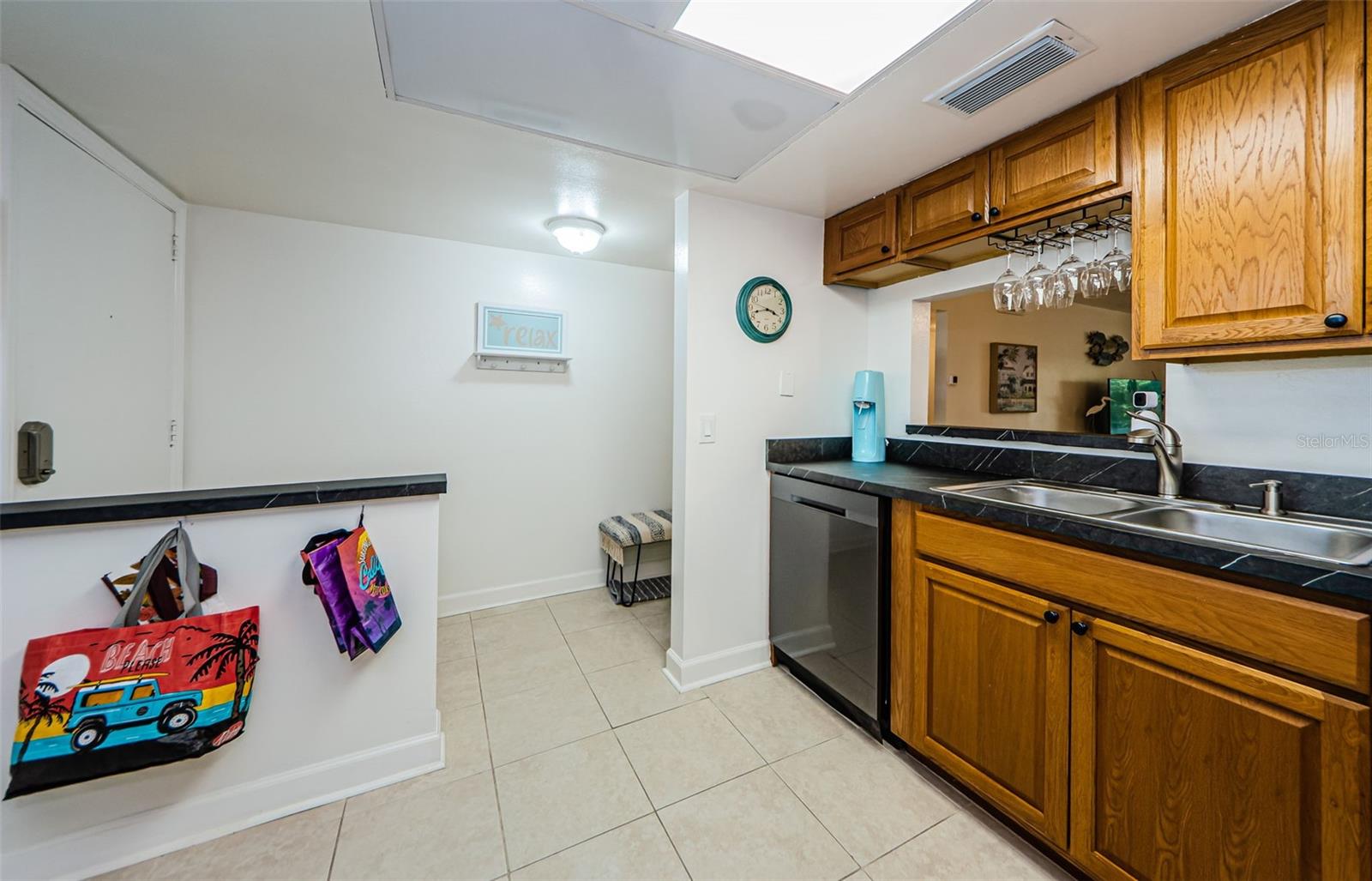 kitchen looking into foyer, ceramic tile