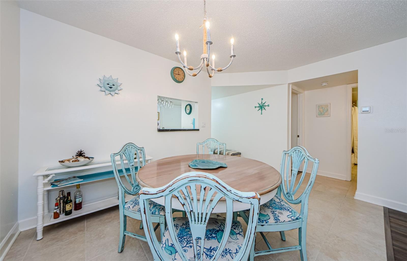 Dining room also has ceramic tile flooring