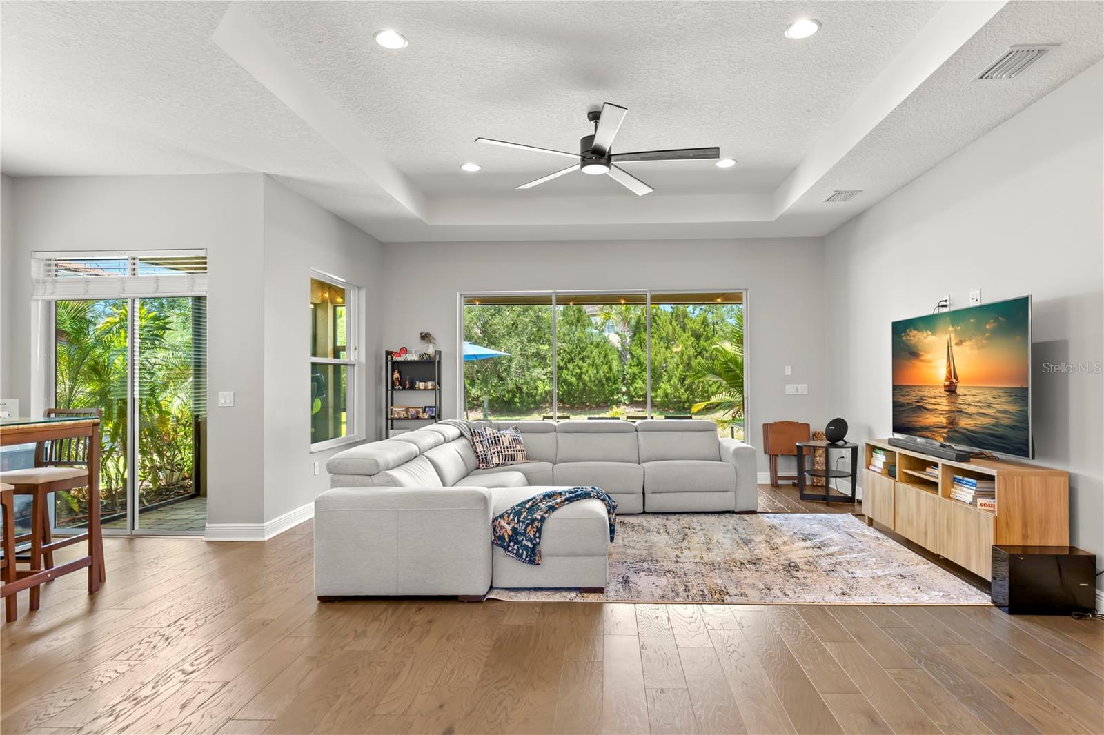 Sliders in Great Room and Breakfast nook open to large screened patio