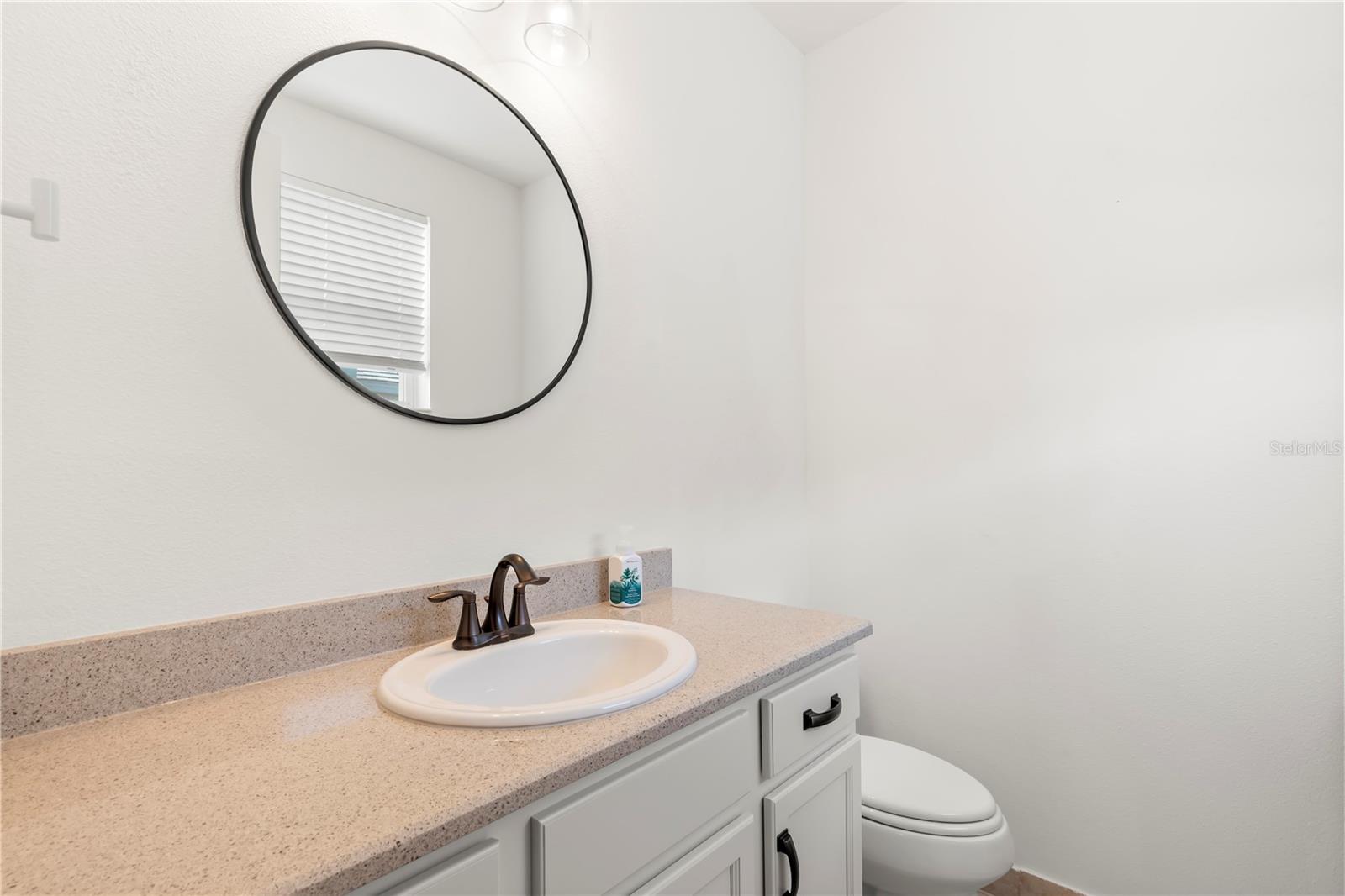En Suite half bath in upstairs Bonus Room