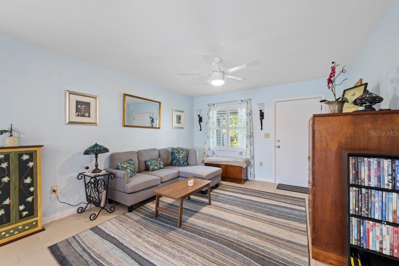 Spacious Great Room showing the door out to the covered lanai.