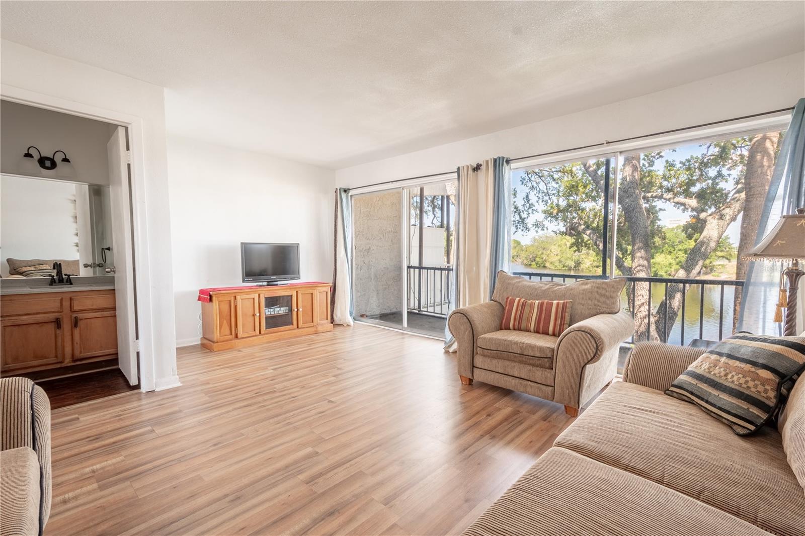 The family room features an abundance of natural light.