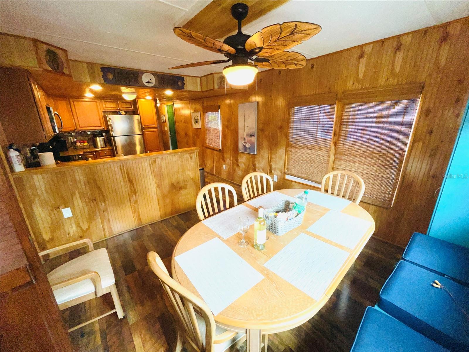 Dining area with pantry and extra storage overlooks the water.  There is also a convenient laundry area just off the dining area.