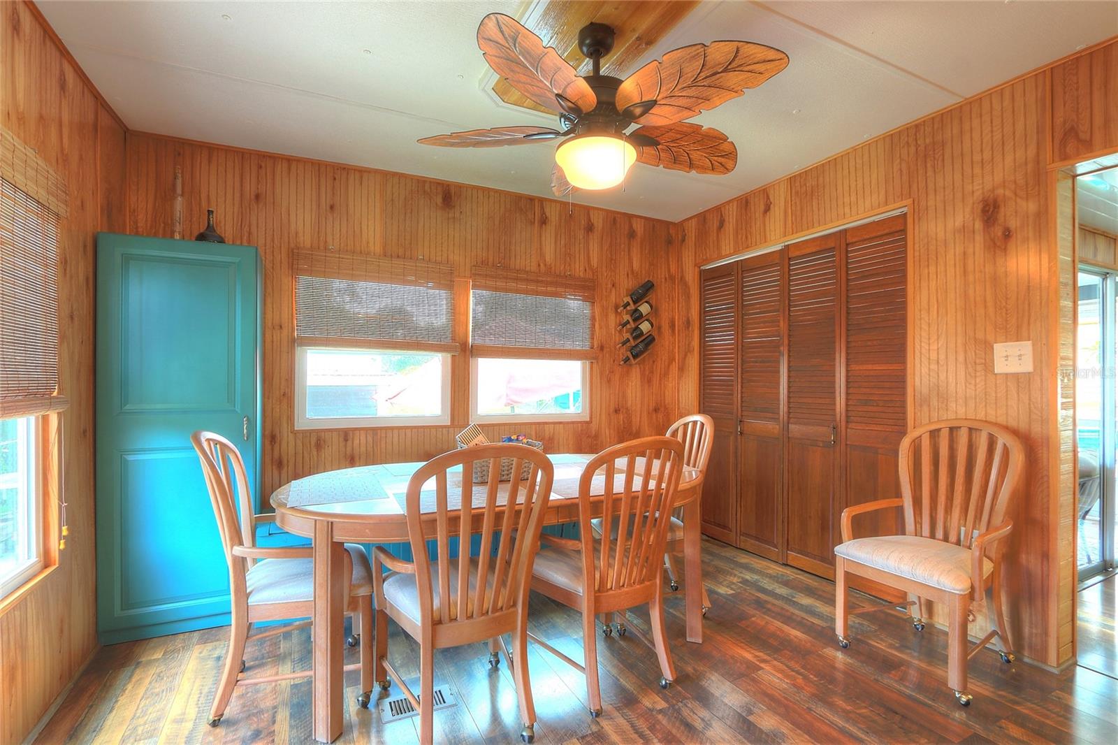 This spacious dining room overlooks the waterfront backyard.  There is a washer/dryer in the closet to the right.