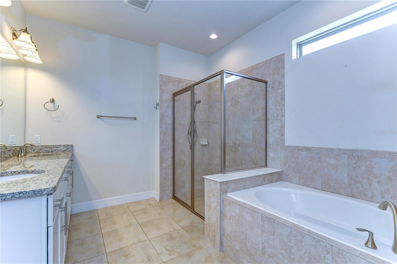 You'll love having both soaking tub and walk-in shower!