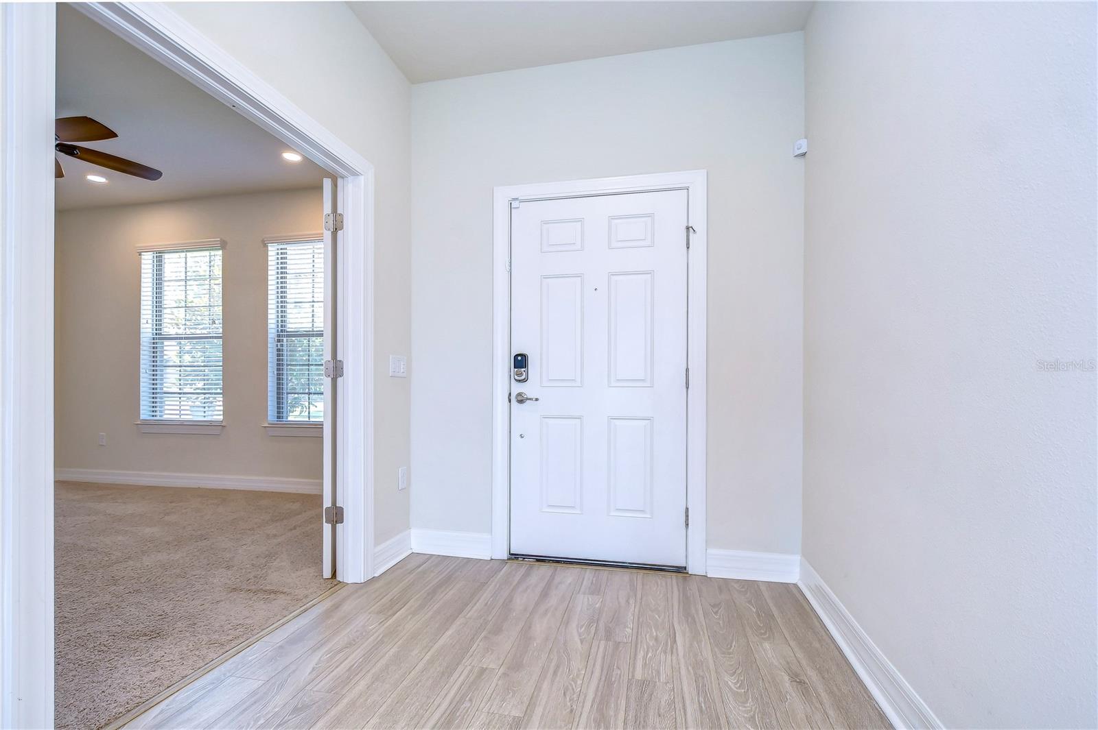 Bright foyer with tall ceilings!