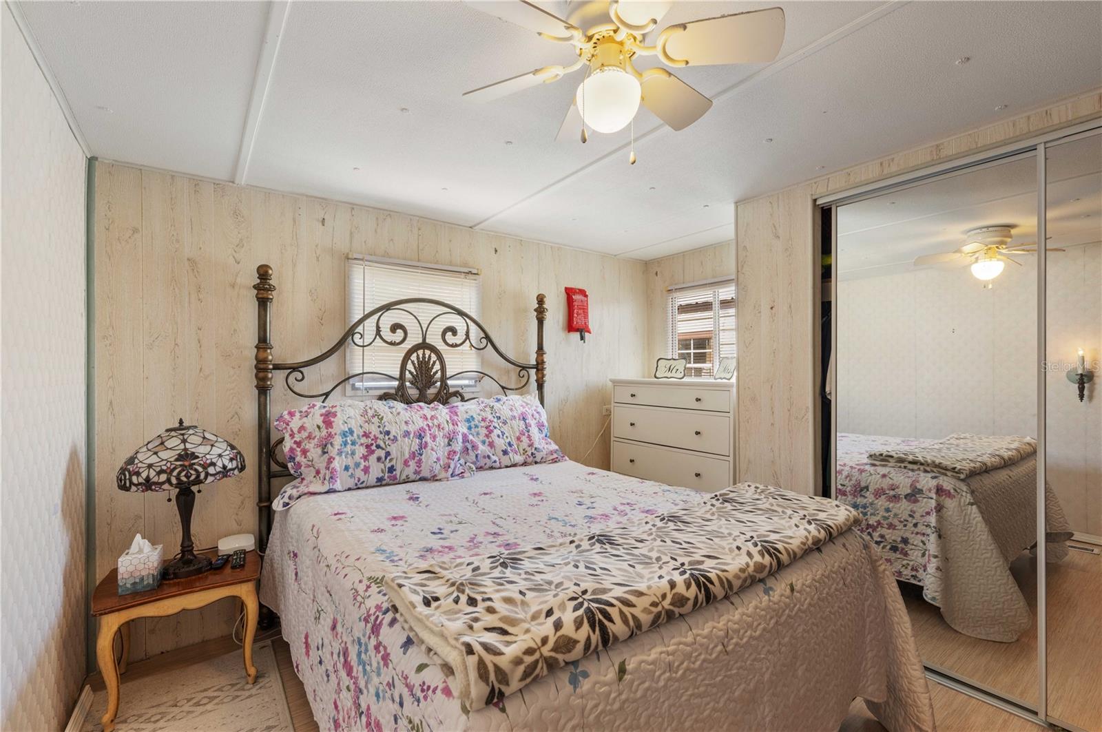 Main bedroom is located in the back of home.