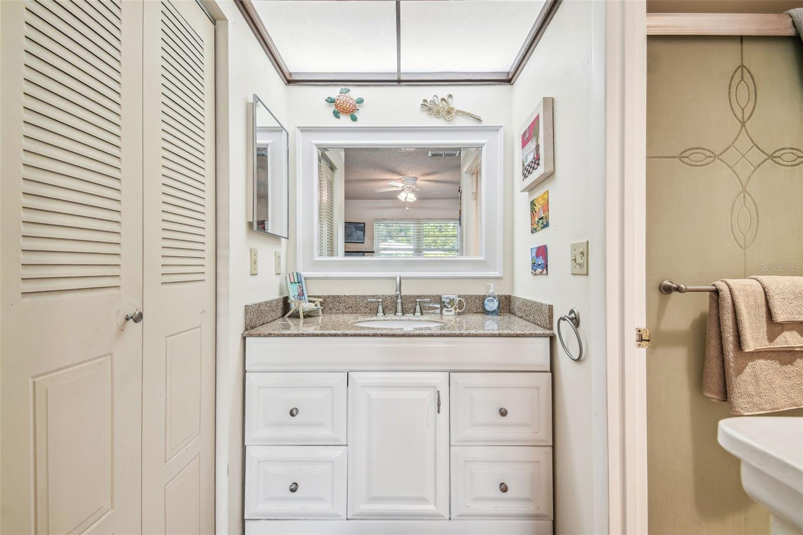 Bedroom includes bathroom sink space