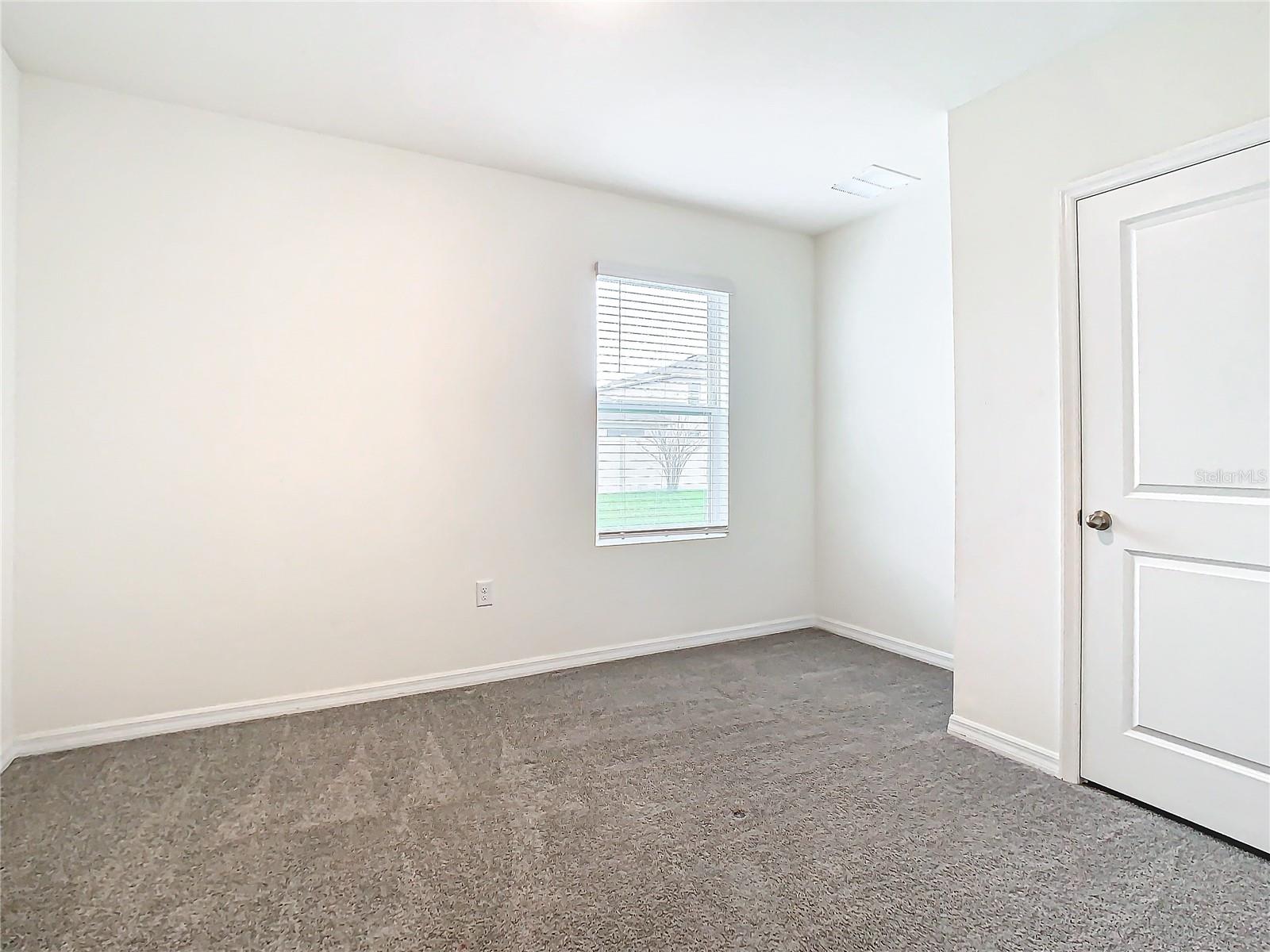 First floor bedroom, closet door.