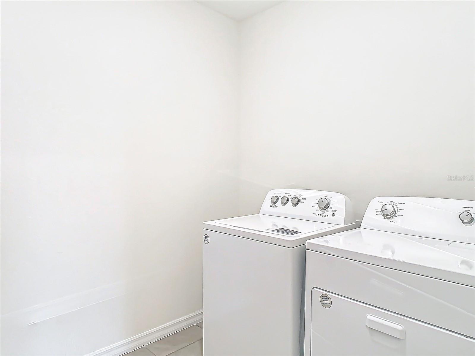 Laundry room located off of the loft.