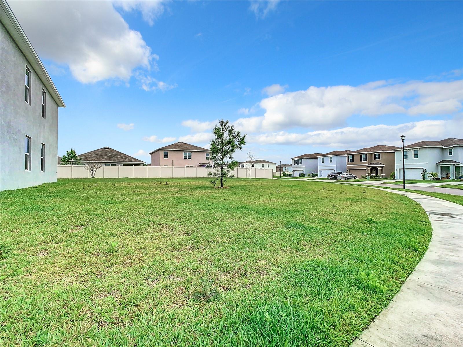 View from the sidewalk at the right hand side of the home.