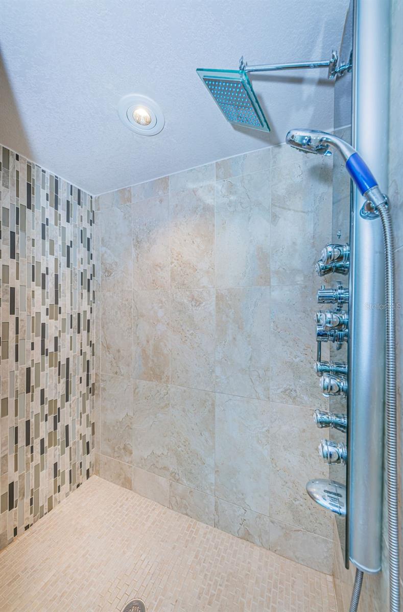 .. Master Walk in Shower with Multiple Shower Heads..