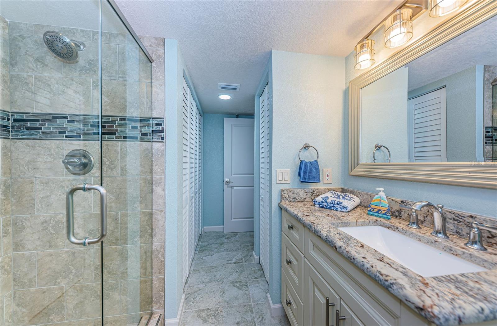 .. Beautiful Remodeled Guest Bathroom..12.1 x 8.1.... Laundry Closet on Left by Bathroom Entry Door.
