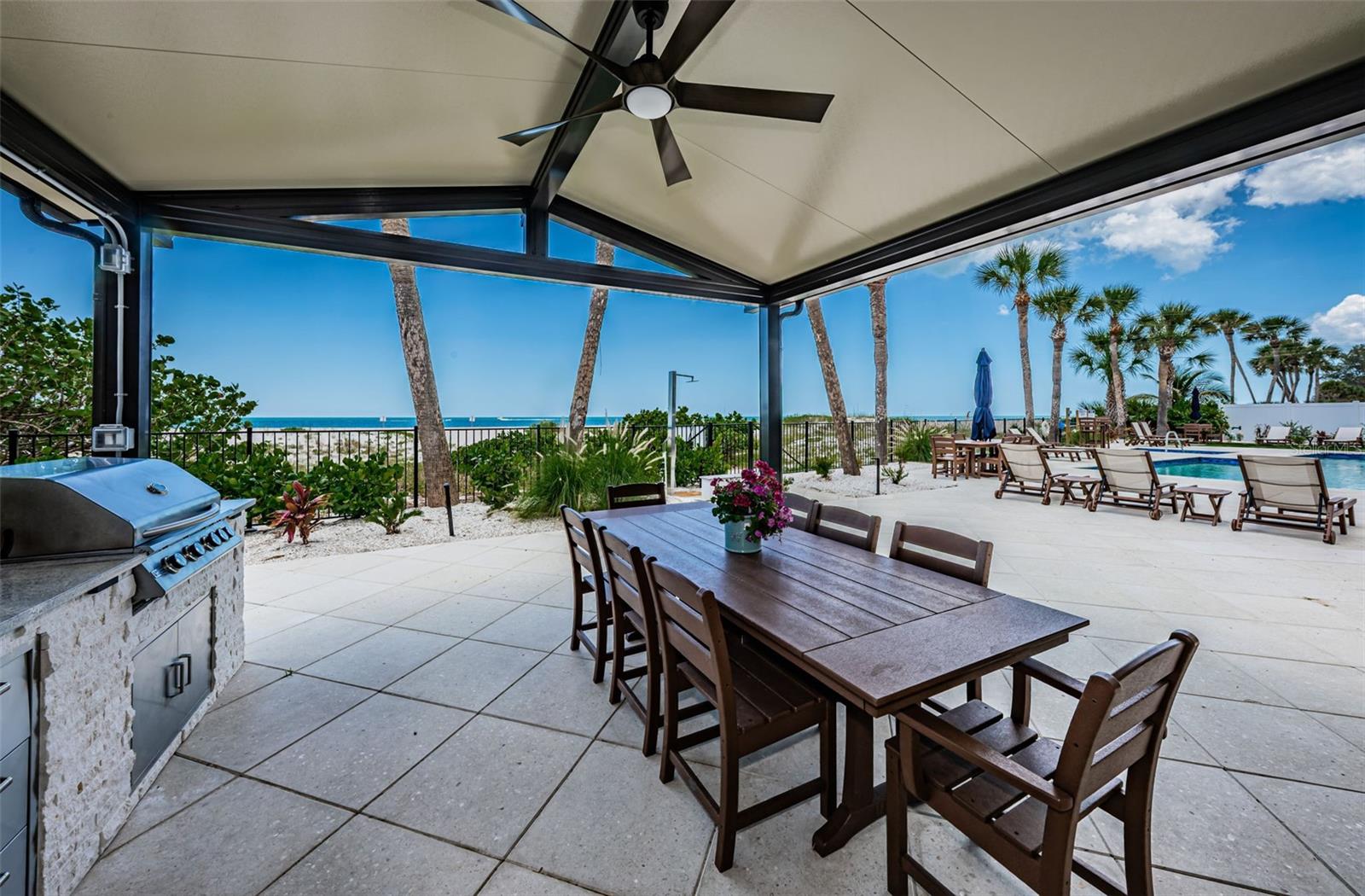 .. Beach Side - Outdoor Shaded Kitchen Area.. Looking Towards Pool & Beach. Foot Shower By Gated Beach Access.