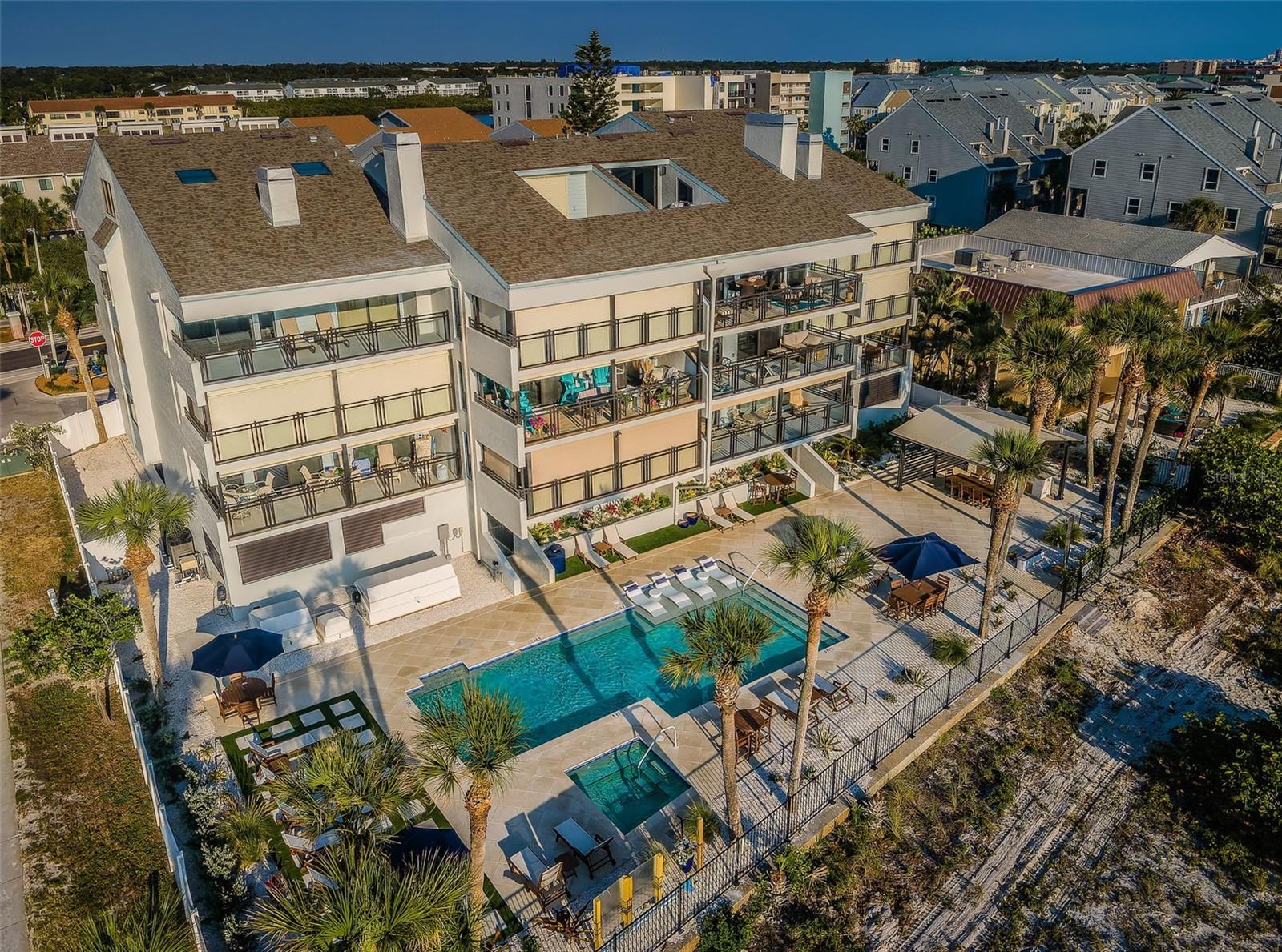.. Aerial of The Beach House Complex.. 12 Residences.. 3 Up and 4 Over.. Under Building Parking and Outside Parking - Everyone is Assigned Two Spots and Recent Building Renovation added a few more Guest Spots..