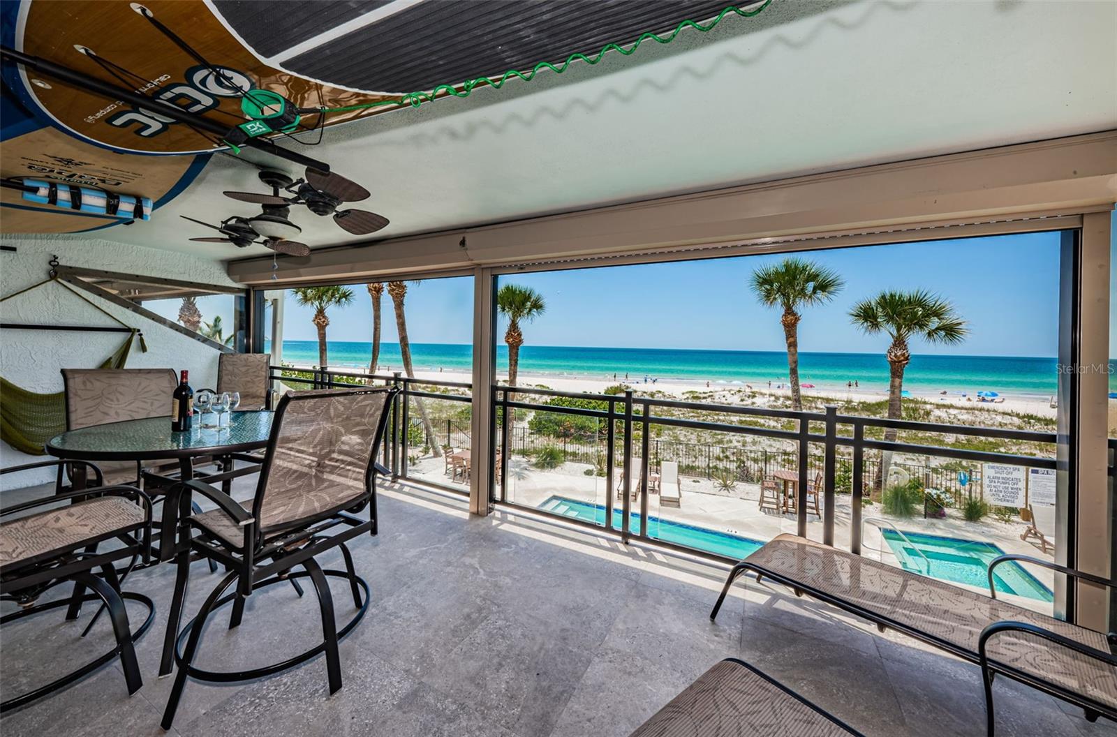 .. Residence # 130 Enjoys a Full Length 26' X 10' Gulf Front Balcony - Equipped with Electric Storm Shutters - Which Makes for Easy Shut Down to Protect Furniture or Use as Afternoon Sun Shades..