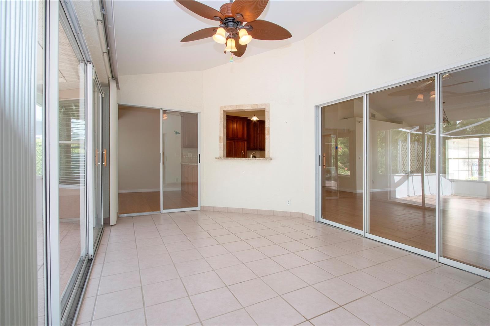 Florida room with  kitchen entrance