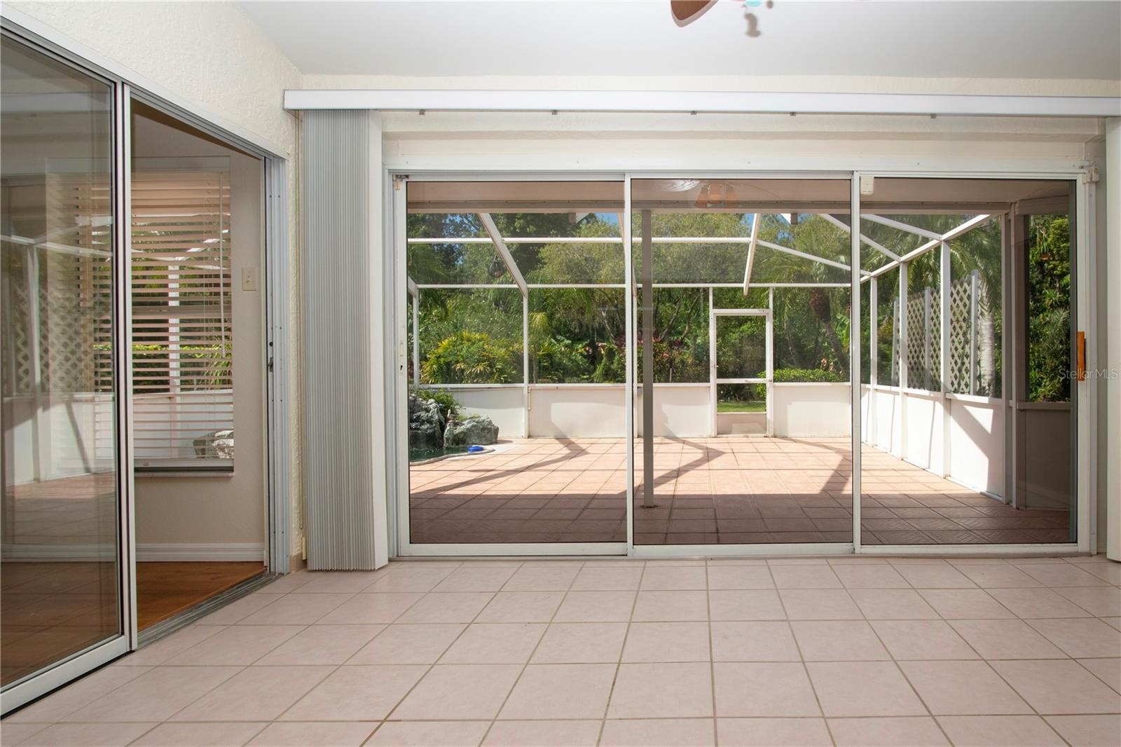 Sliders to lanai and ensuite primary bedroom