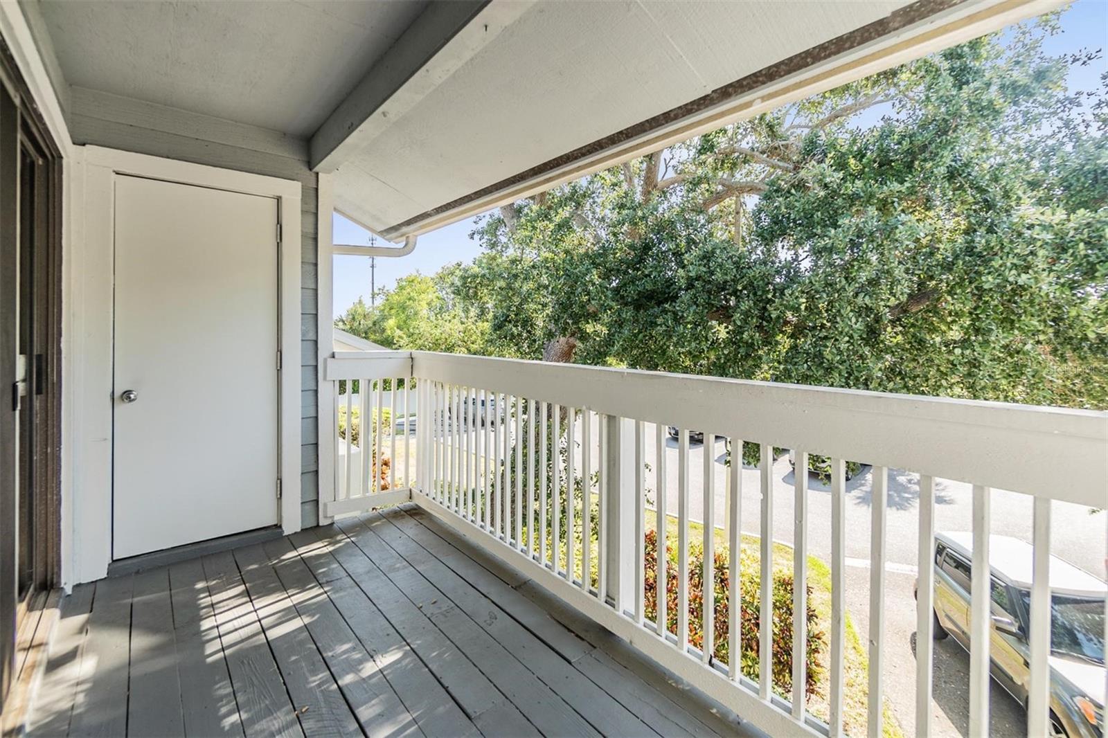 Balcony off living room w/storage closet