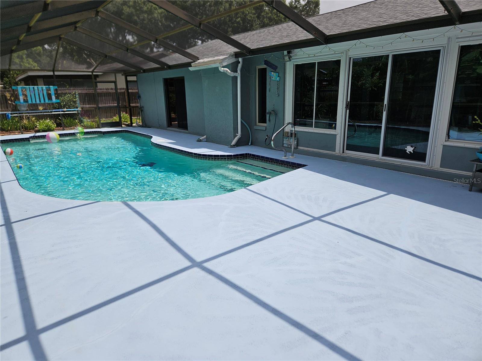 Large pool deck recently painted.