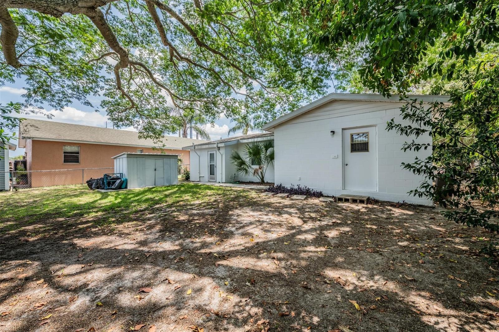 Large backyard with shed