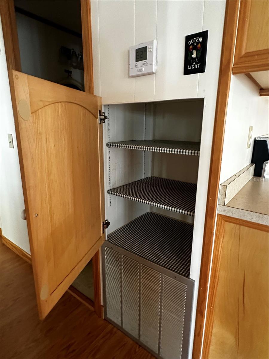 Additional storage next to kitchen