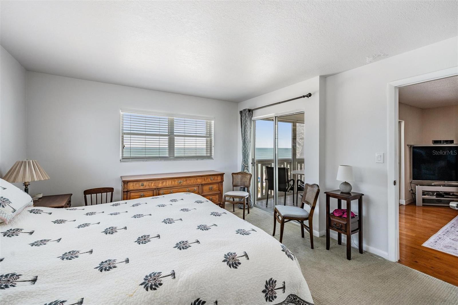 Primary bedroom has access to the balcony, and water views on three sides!