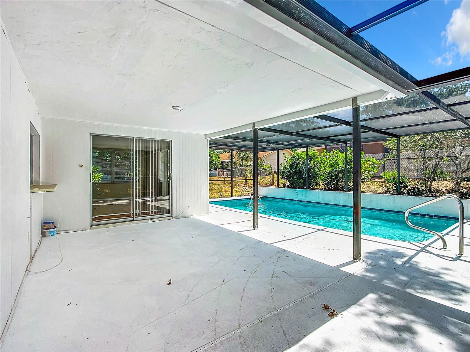 Covered rear patio by pool