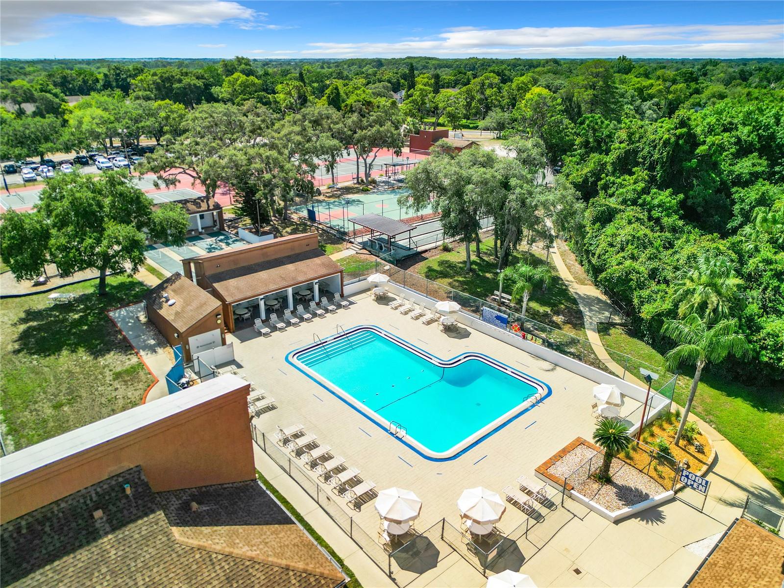 Community HEATED pool, TENNIS COURTS, SHUFFLEBOARD, ETC