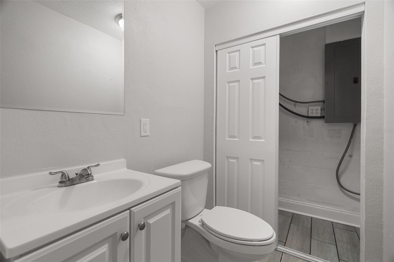 Half bath with laundry as you walk in from the 2 car garage