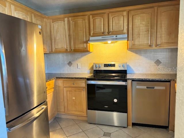 Kitchen with new oven and dishwasher