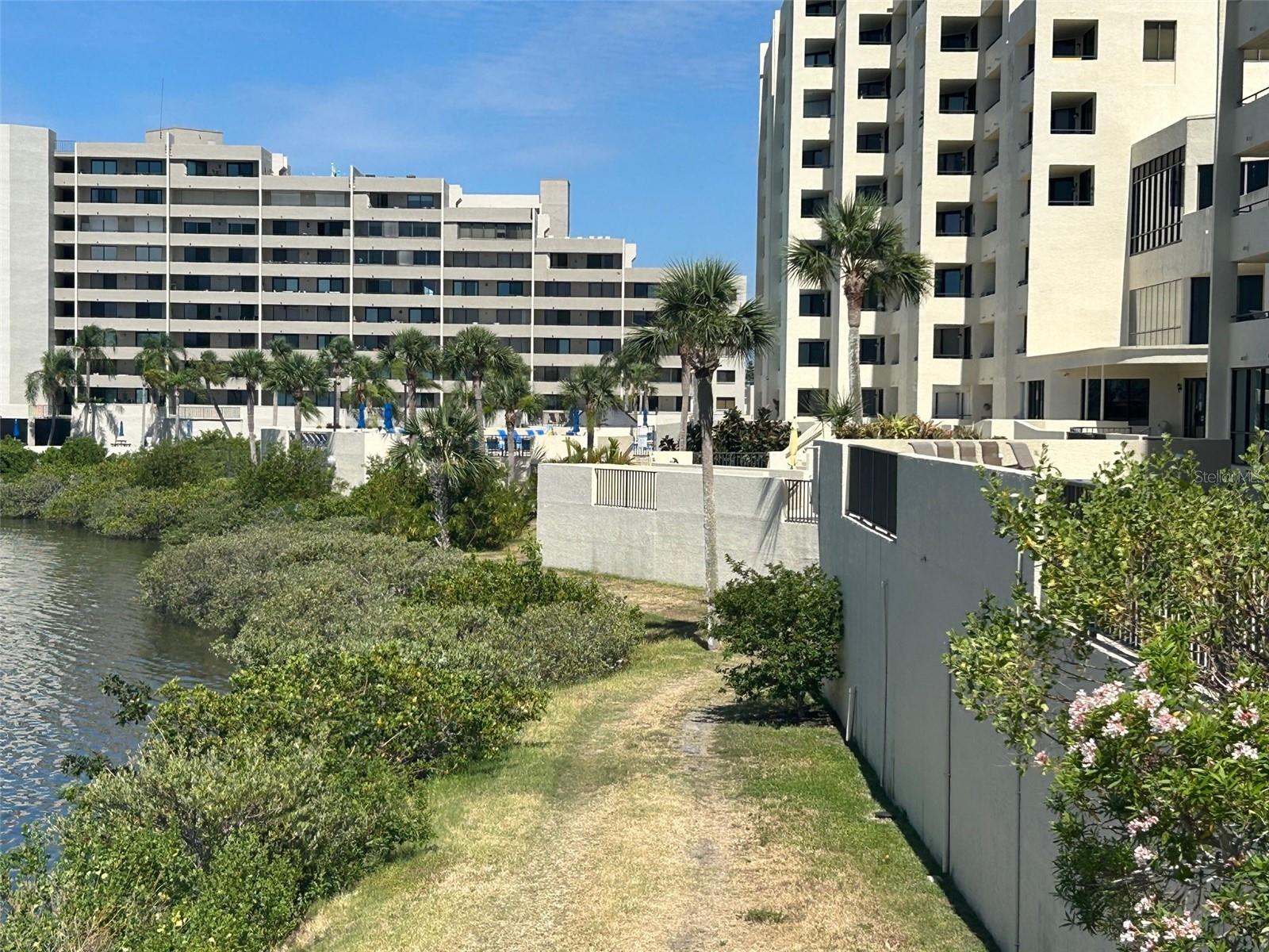 Condo has a conveniently located staircase down the ground level with direct views of the lagoon, beach and Nature Trail.