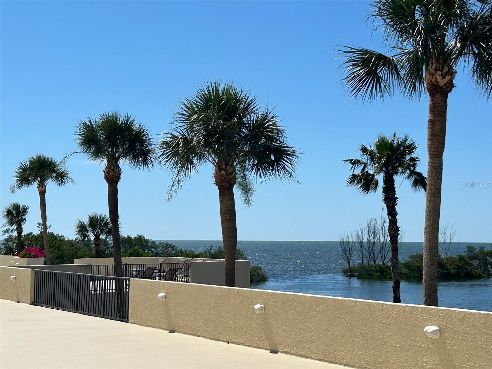 The open Gulf of Mexico lies just beyond the lagoon's breakwater.