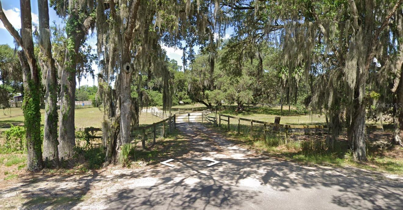 Treed lined Gated Entry---just charming