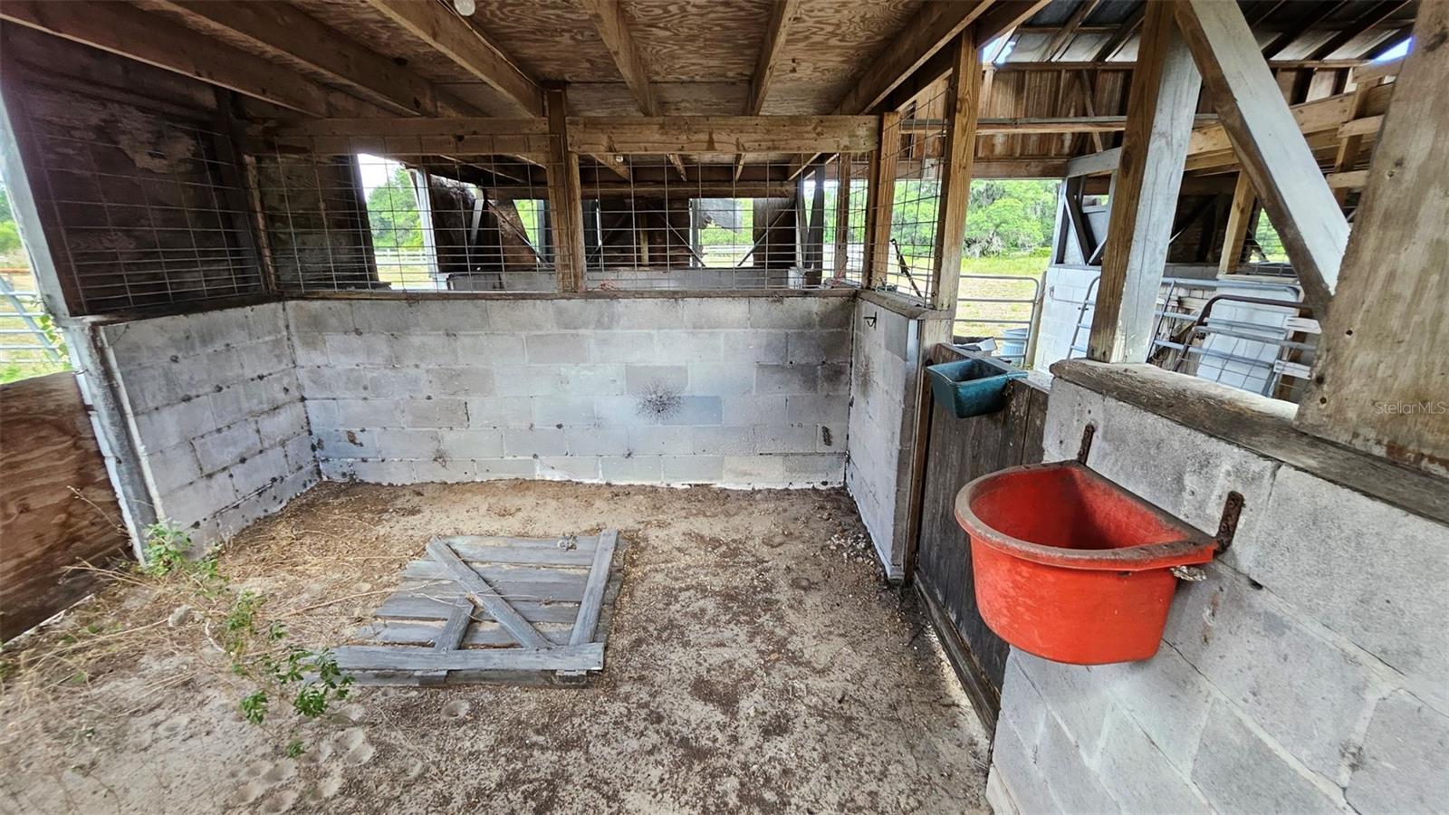 typical stall in the concrete barn