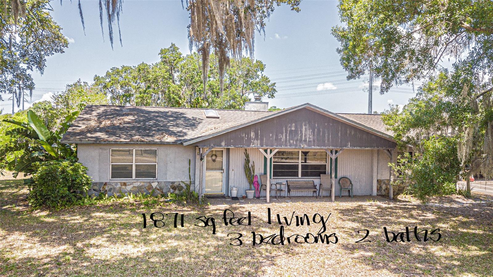 Drone photography of the property on 6/3/24; roof replaced in 2015; home needs some tlc