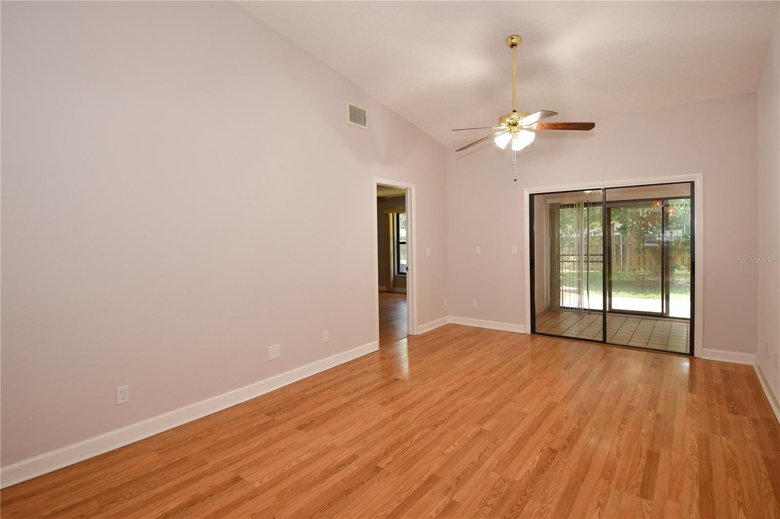 Large living space leading to the enclosed Florida Room.