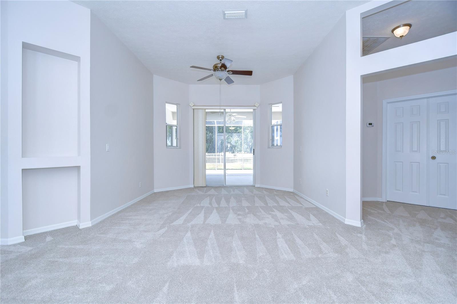 Formal living room with slider to lanai!