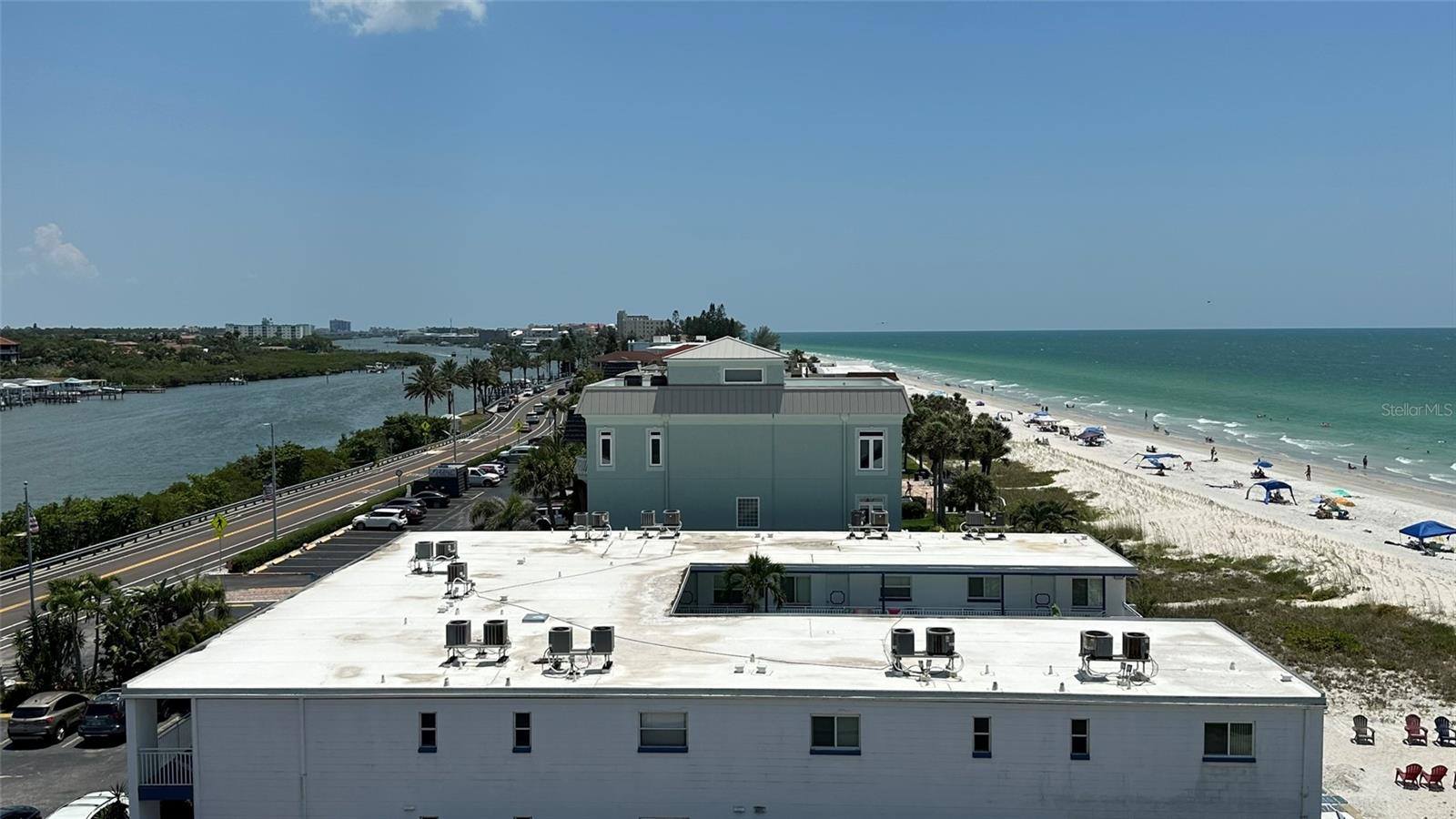 Roof view looking South with Intercoastal on left and Gulf of Mexico on Right