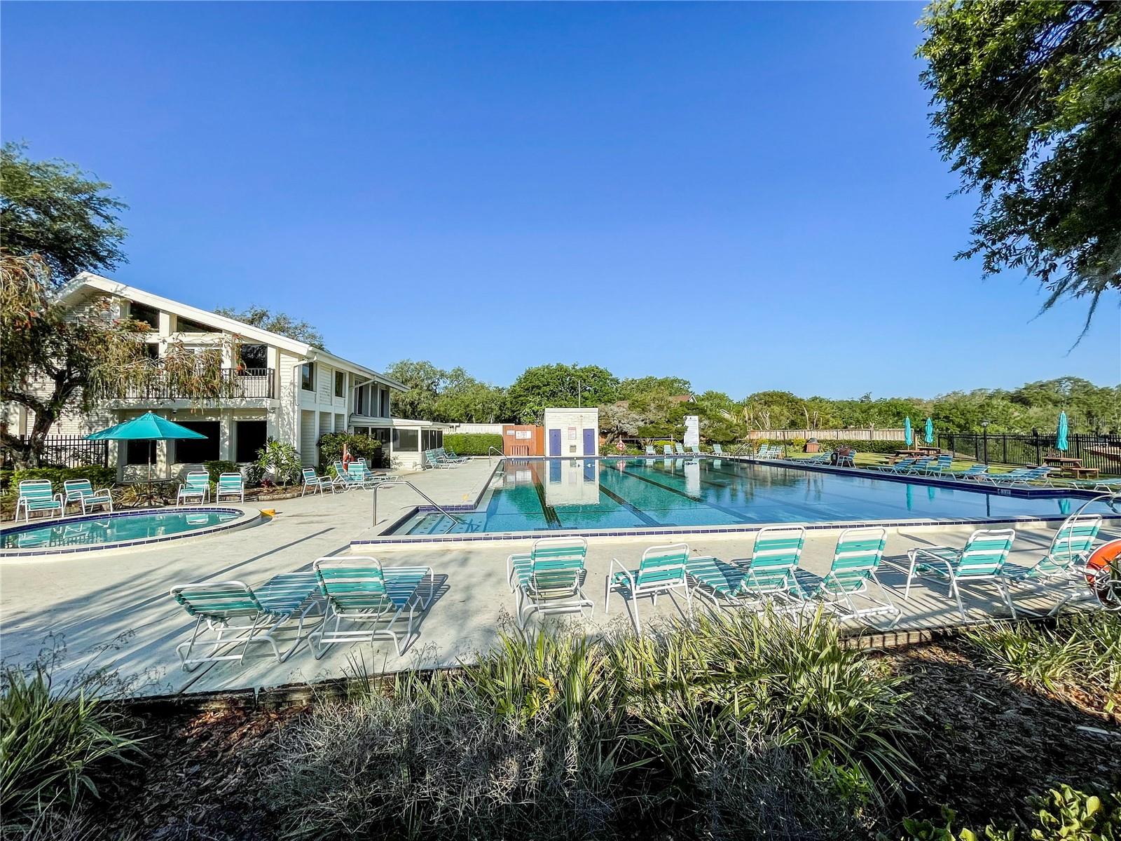 HUGE pool with plentiful lounging!