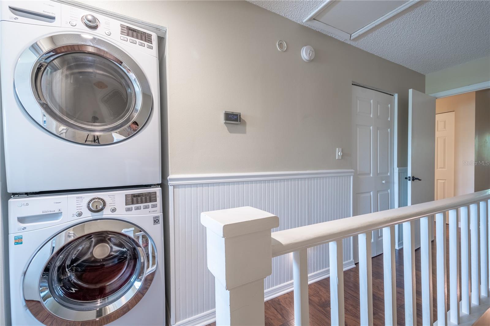 A stackable washer/dryer is conveniently located on the 2nd floor.