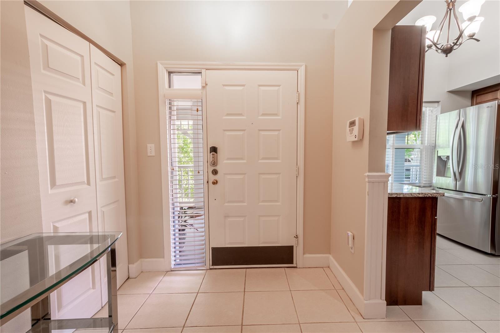 The interior entryway features a convenient coat closet.