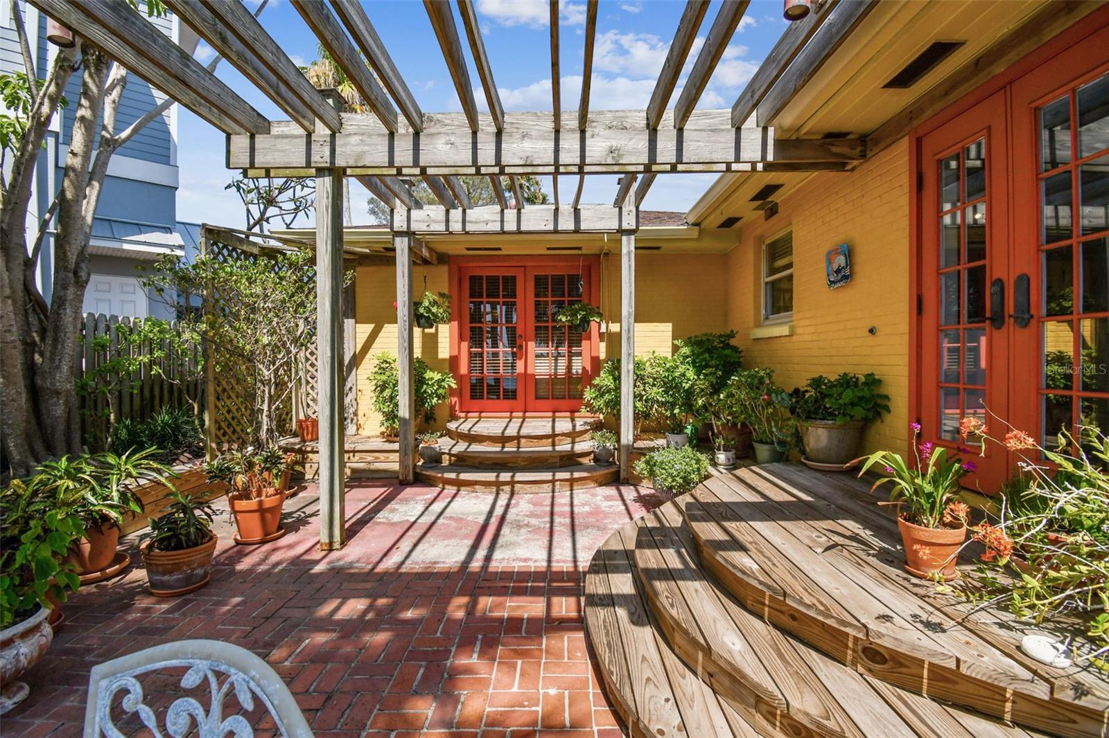 Pergola and French doors to Guest Suite