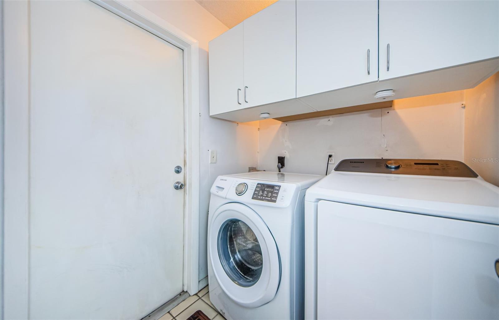 Laundry room off foyer