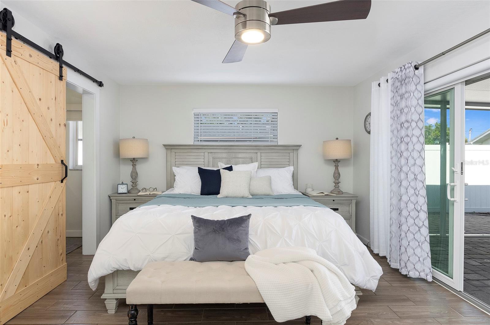 Master bedroom and sliding glass doors to sunroom