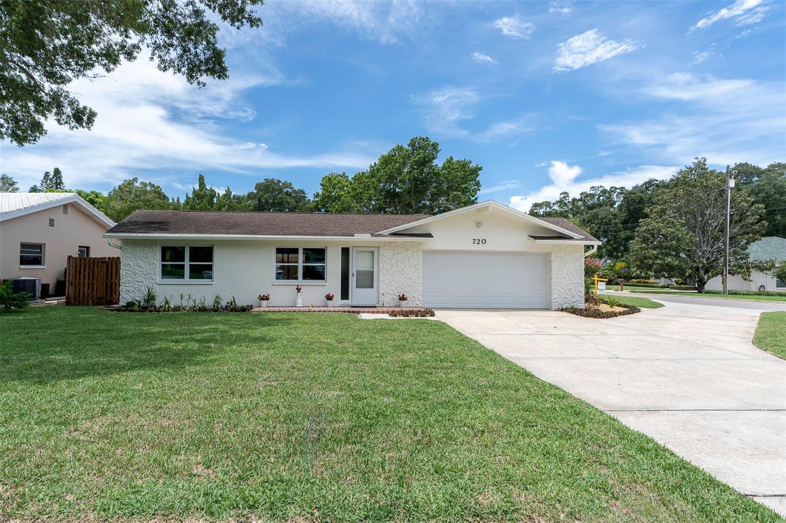 2 car garage with circular driveway