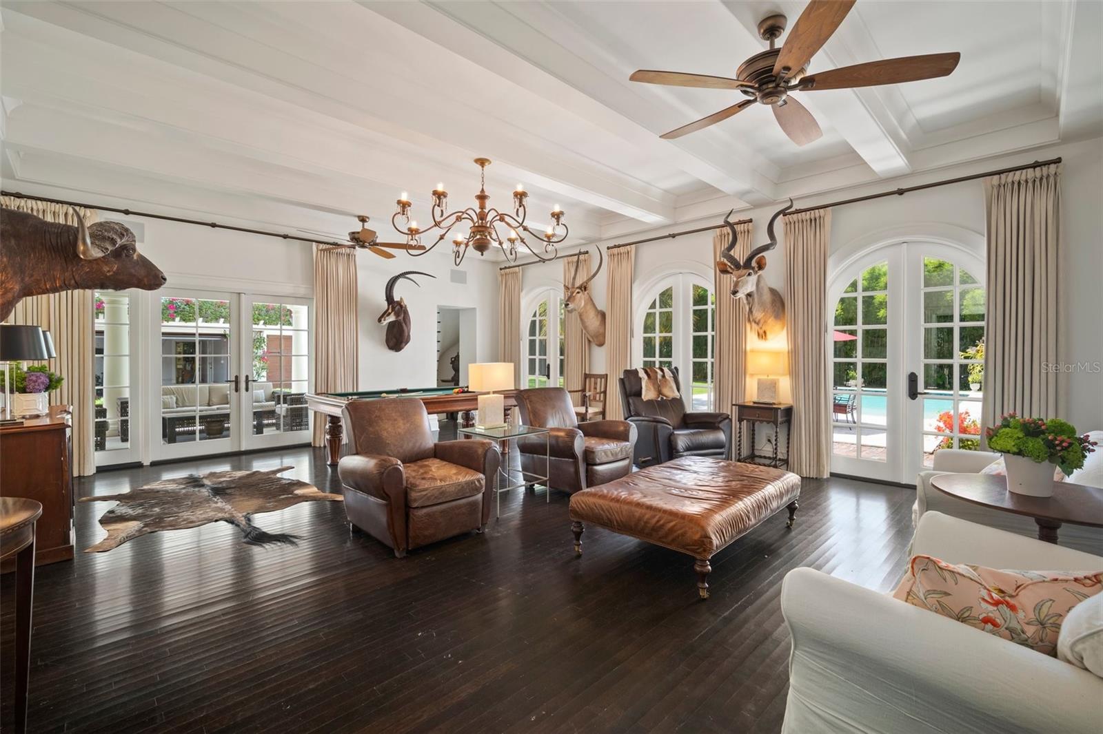 EASY TO SEE WHY THE DOWNSTAIRS FAMILY ROOM WAS ONCE USED AS A BALLROOM