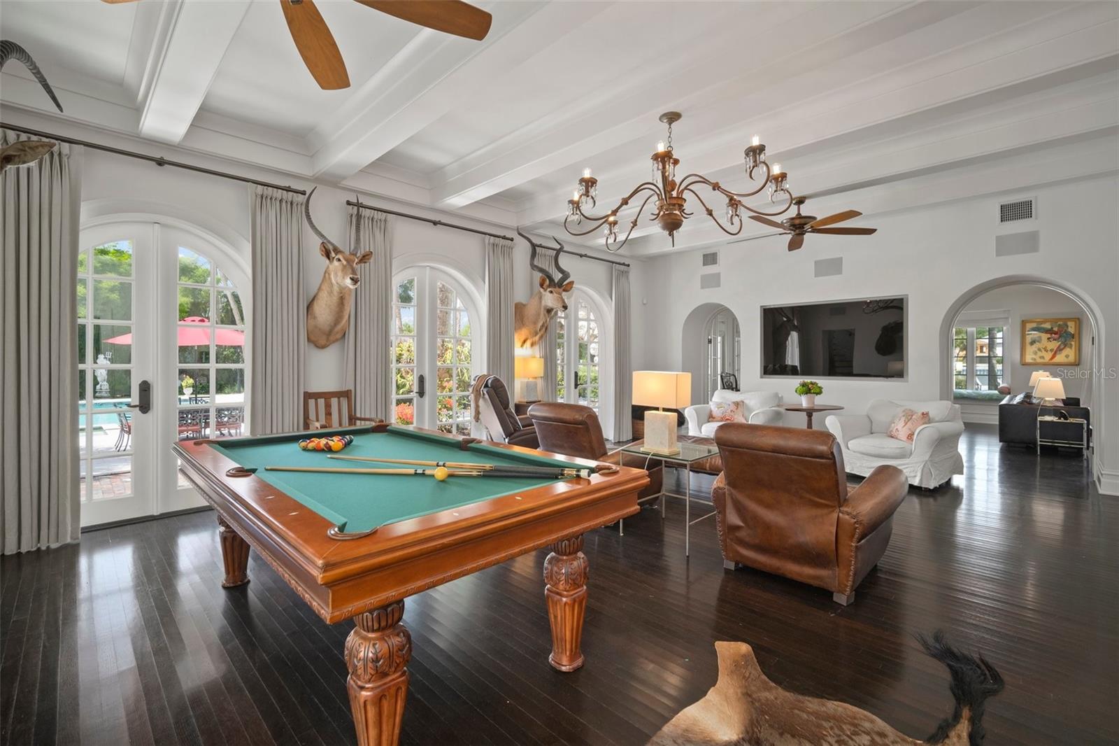 ROOM FOR POOL TABLE AT ONE END AND LARGE SEATING AREA AT THE OTHER.