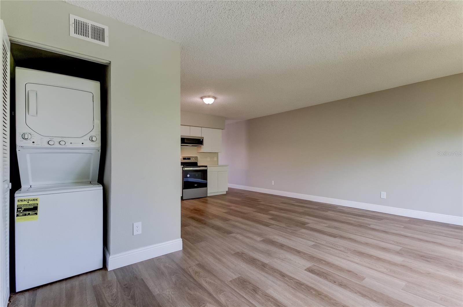 Stackable washer/dryer in Family Room